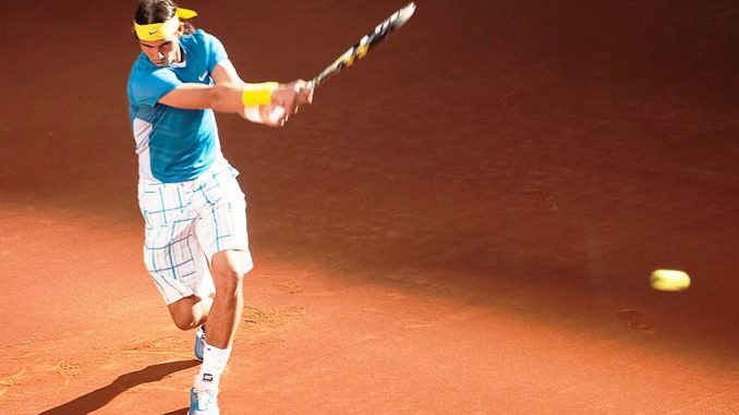 Rafael Nadal Plays Tennis with Fan